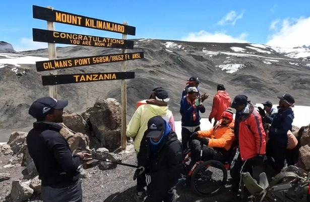 At the top of Kilimanjaro in armchair.